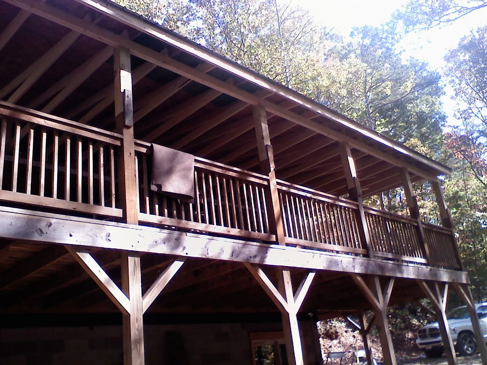 Timber framing under a new elevated porch and deck — Roof Leak Repair in Chinquapin by Roofing Brothers